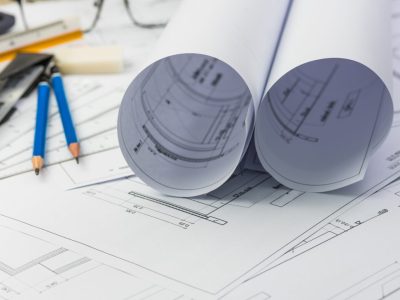 Construction-blueprints-and-pencils_medium-1536x1025